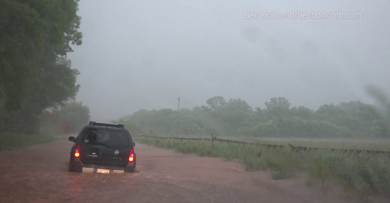 Car drives into flooding